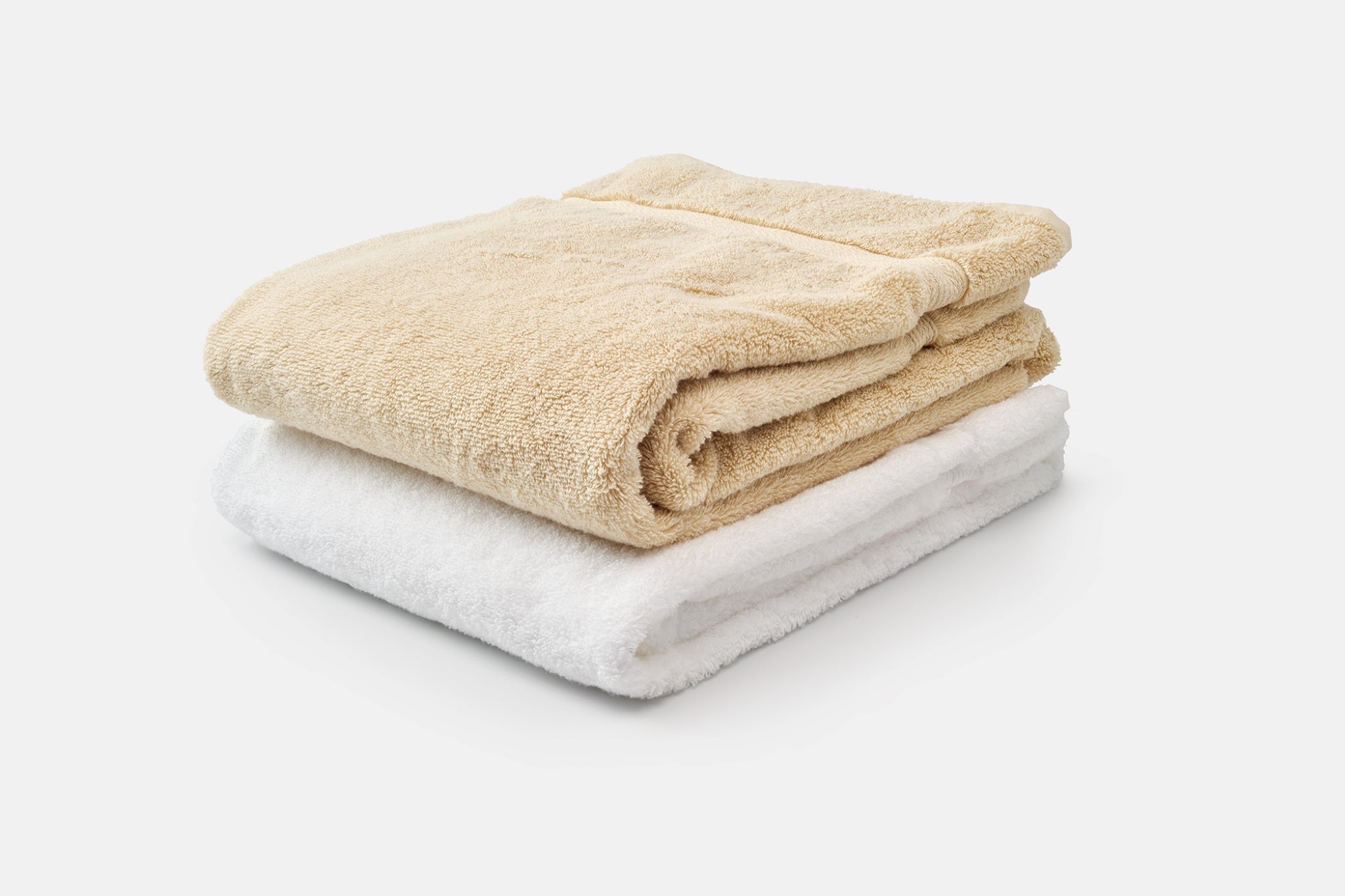 Stacked Bath Towels Color White and Natural Bath Towels Ethically Made Luxury Cotton Made in USA